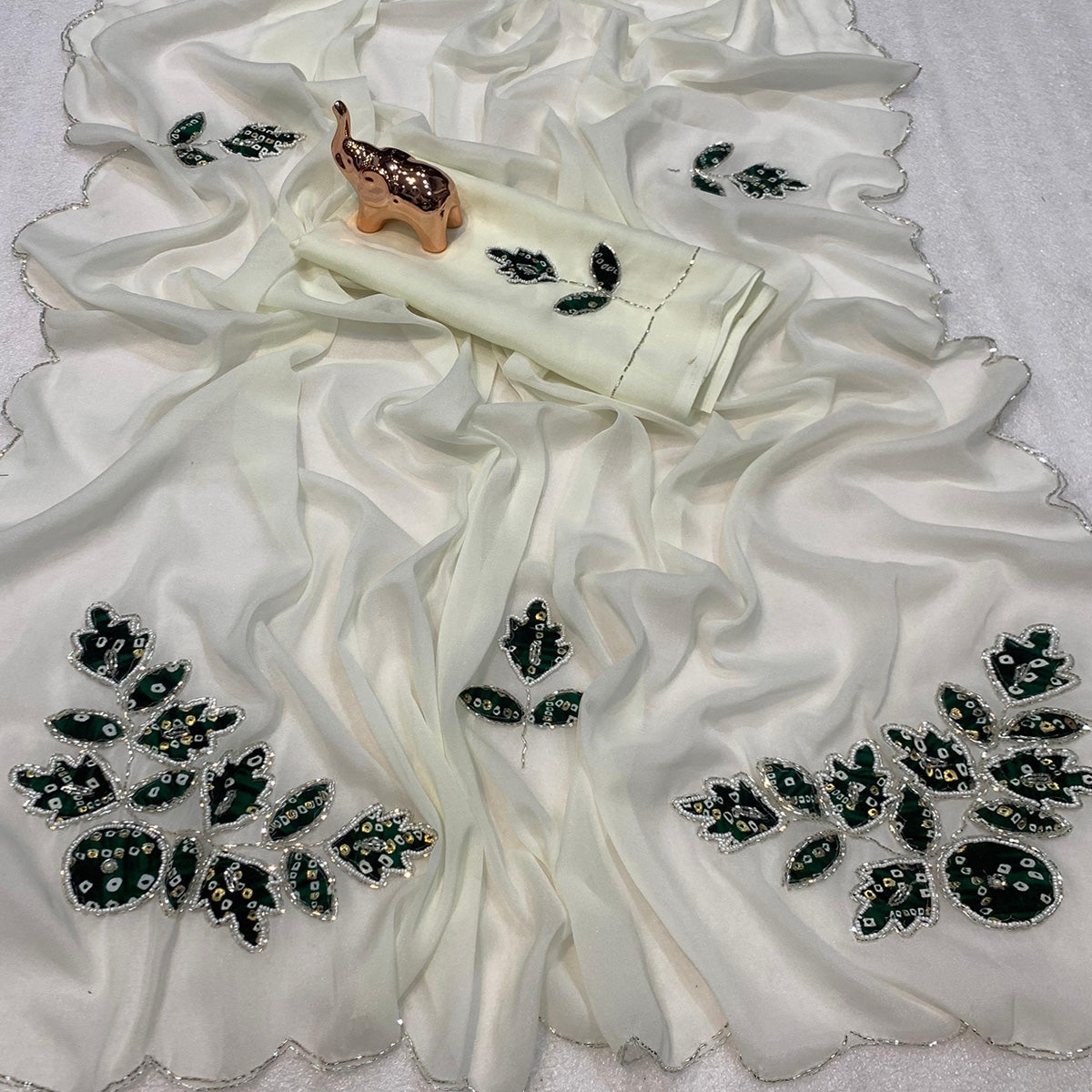 White & Green Partywear Georgette Saree with Delicate Stone & Bead Work