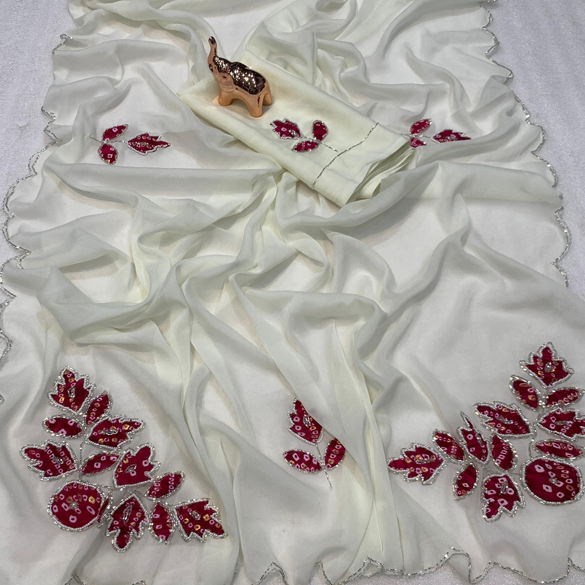 White & Pink Partywear Georgette Saree with Delicate Stone & Bead Work