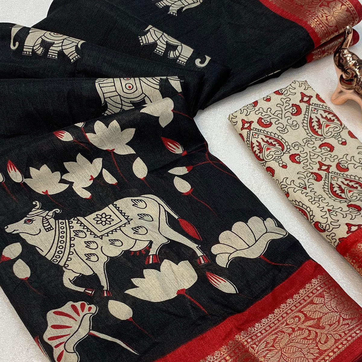 Heritage Inspired Black Mulmul Saree Featuring Pichwai Art Prints