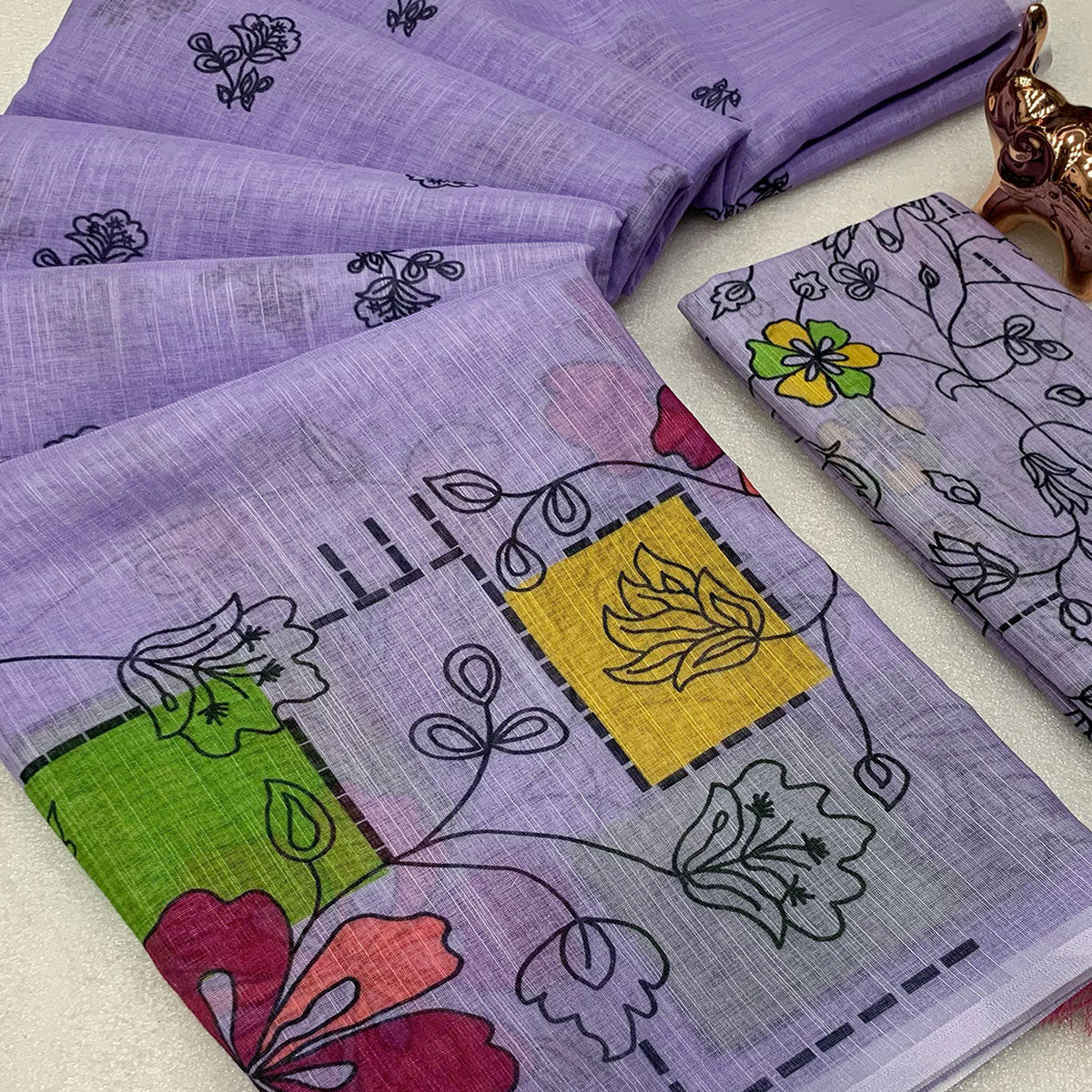 Lavender Floral Printed Linen Saree With Elegant Tassel Border