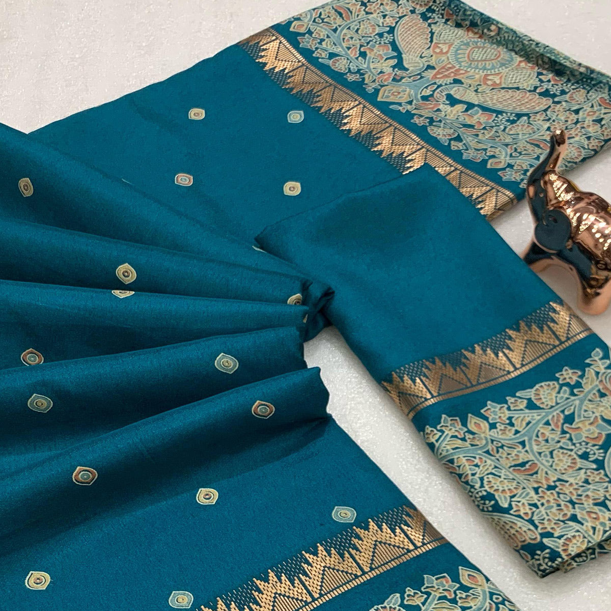 Teal Cotton Silk Saree with Zari-Woven Border and Artistic Printed Details
