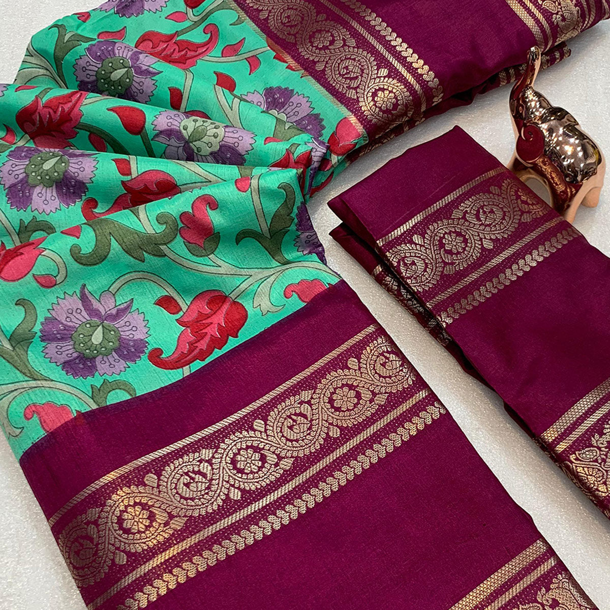 Sea Green Saree In Dola Silk Featuring Floral Kalamkari Print & Rich Jacquard Border