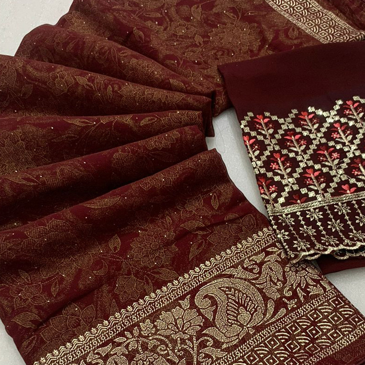 Maroon Floral Foil Printed Georgette Saree With Tassels