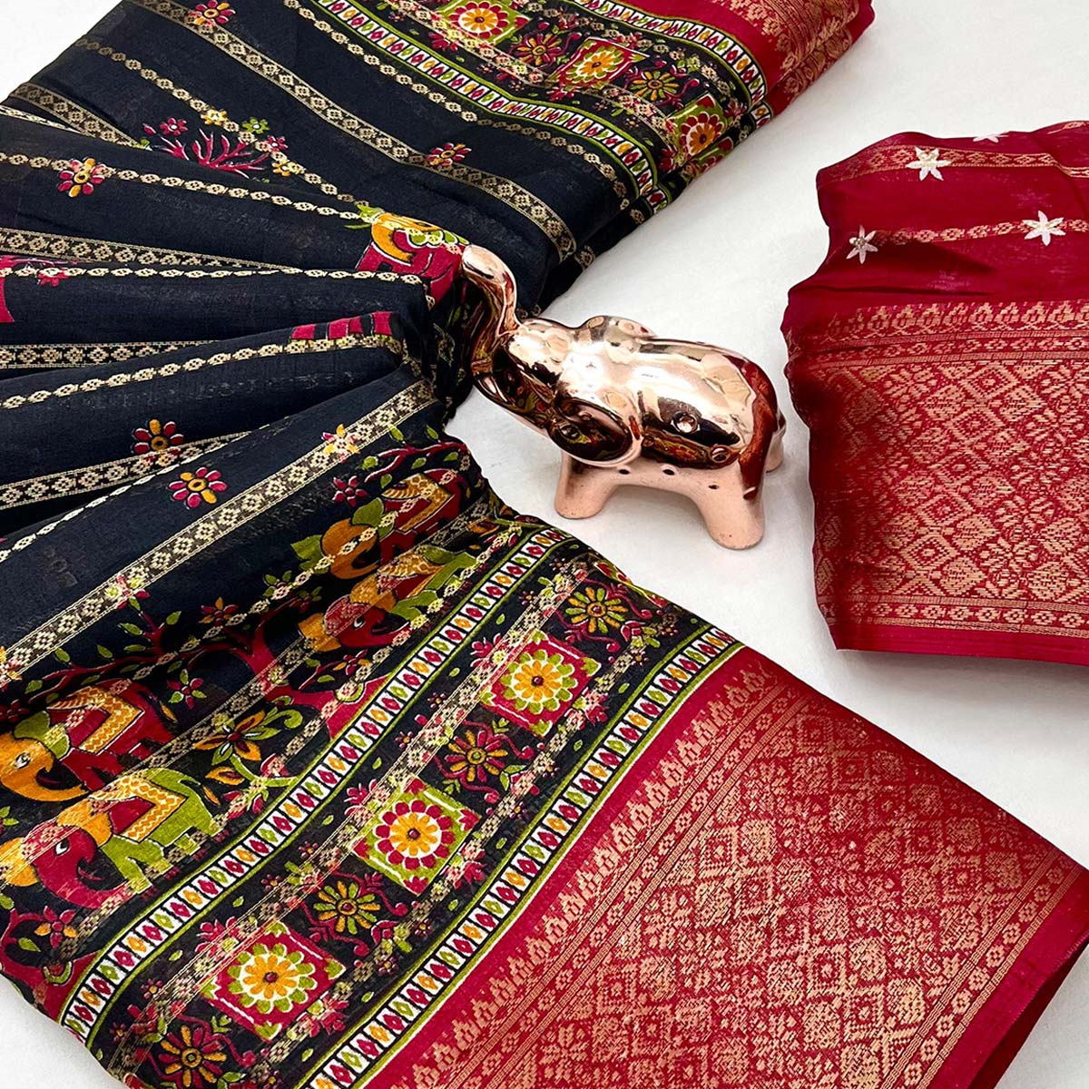 Regal Black Weaving Dola Silk Saree Adorned With Artistic Elephant & Floral Print