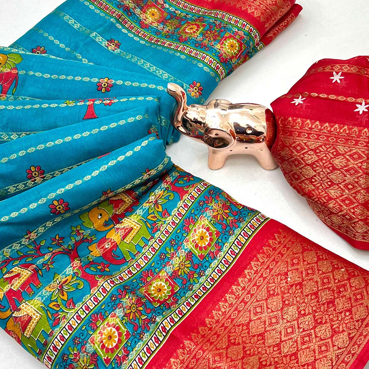 Regal Blue Weaving Dola Silk Saree Adorned With Artistic Elephant & Floral Print
