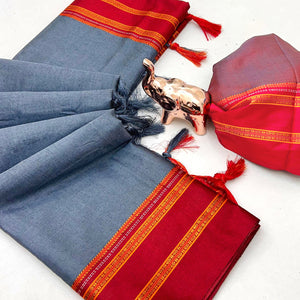 Classic Grey Solid Weaving Pure Silk Saree Accented With Woven Striped Pallu & Tassel Finish