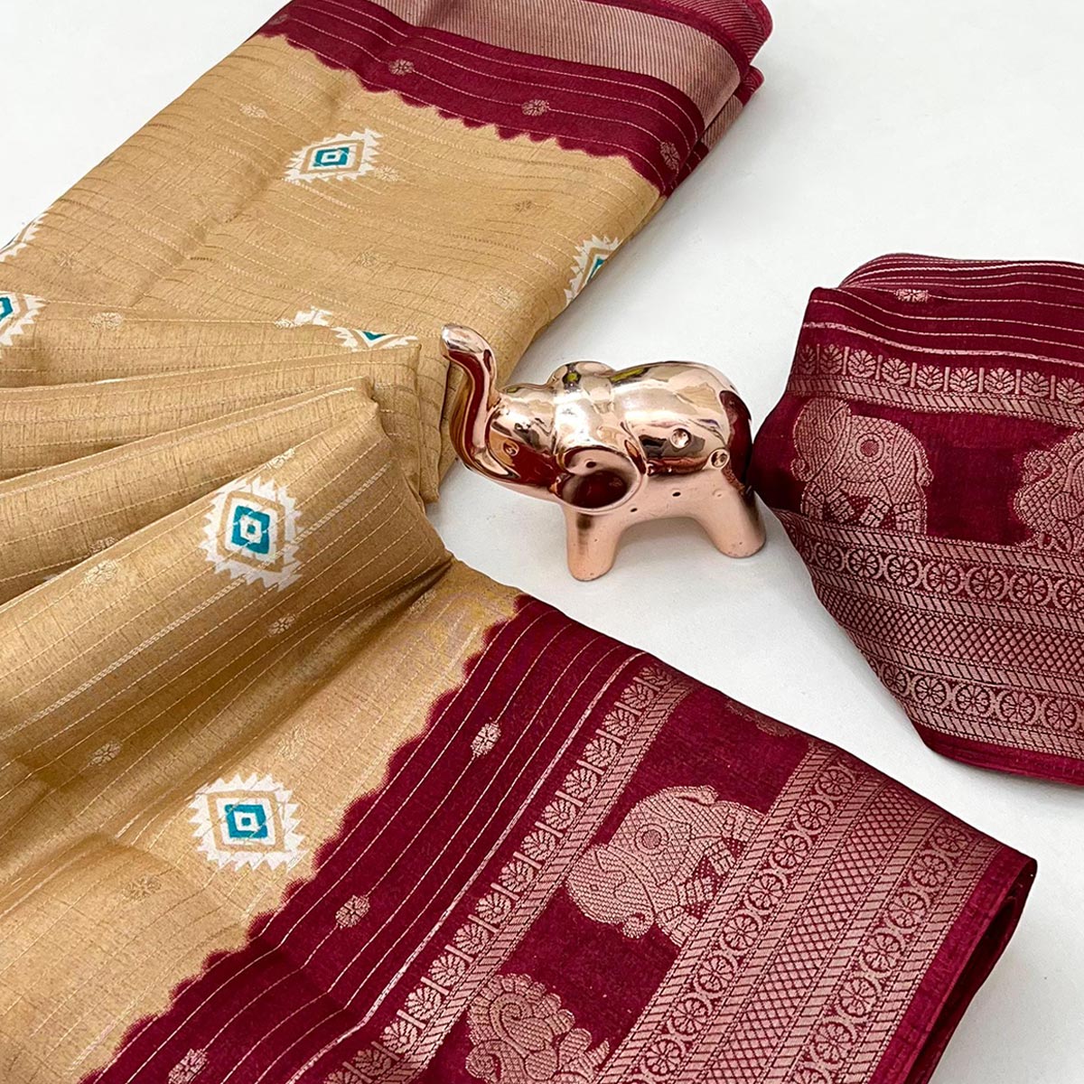 Charming Chikoo Printed Cotton Silk Saree With Elephant & Peacock Design Weaving Border
