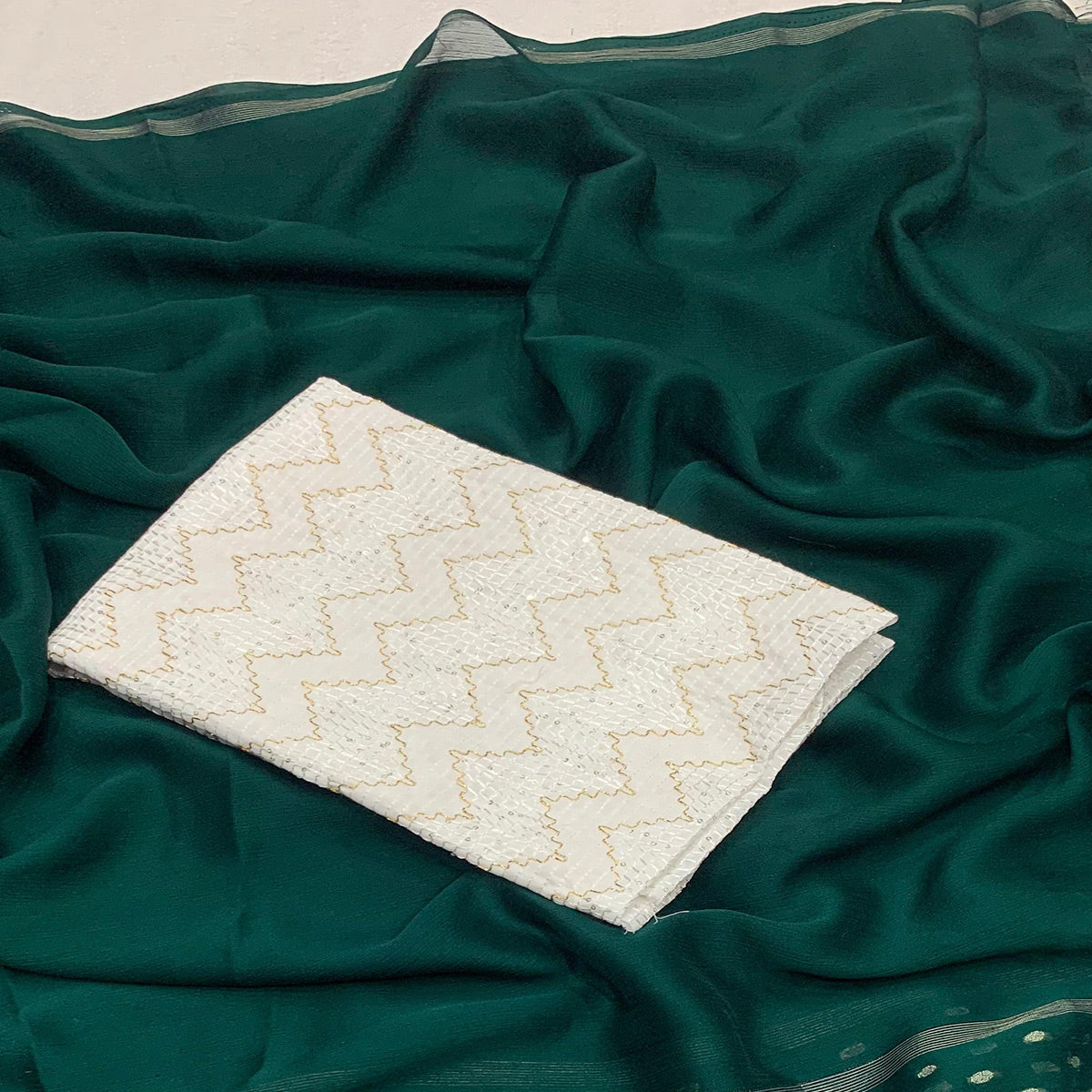Green Woven Georgette Saree With Tassels