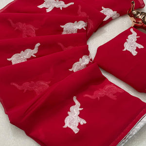 Pink Georgette Saree Featuring Exquisite Elephant Embroidery