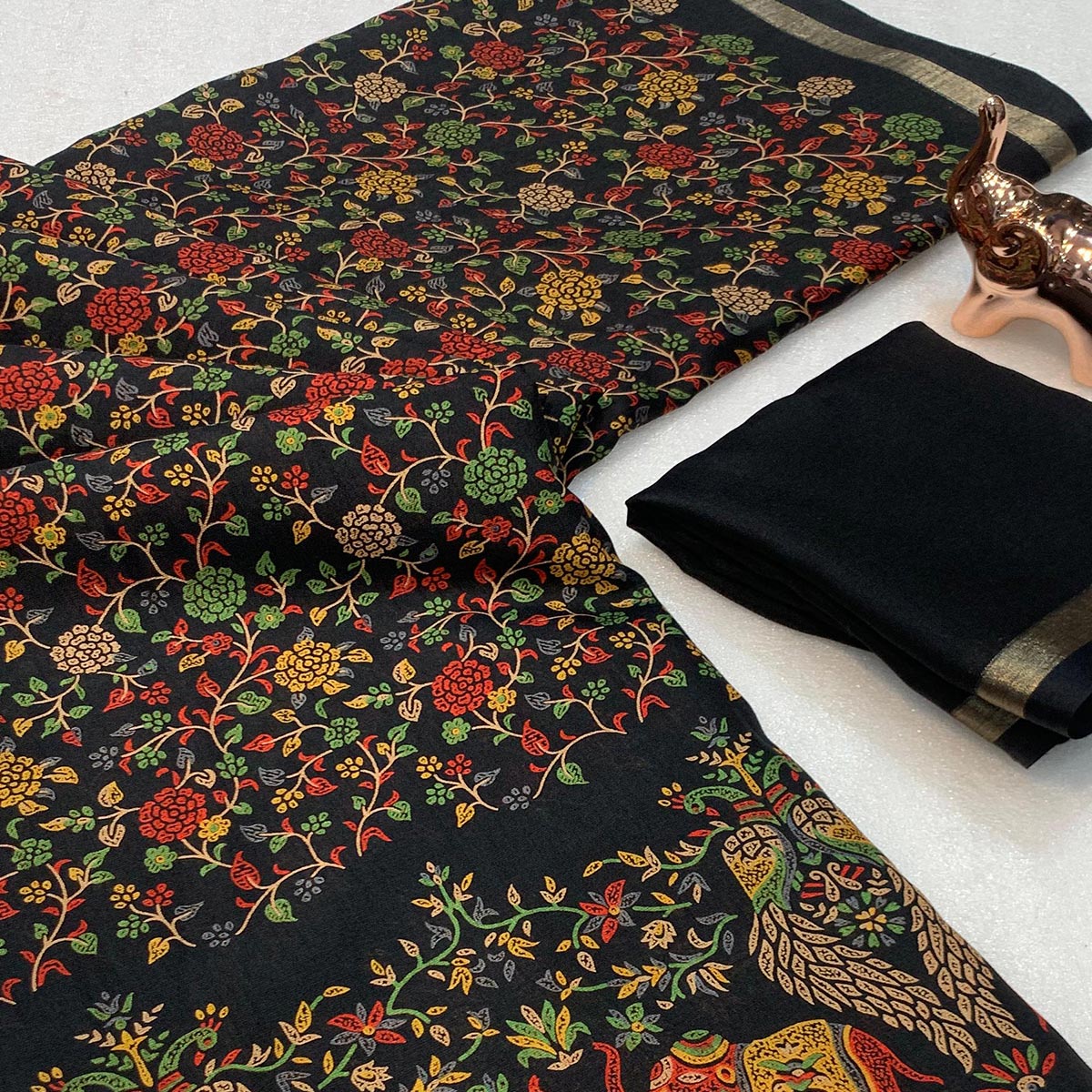 Black Floral Printed Tussar Silk Blend Saree Accentuated With Rich Zari Border Work