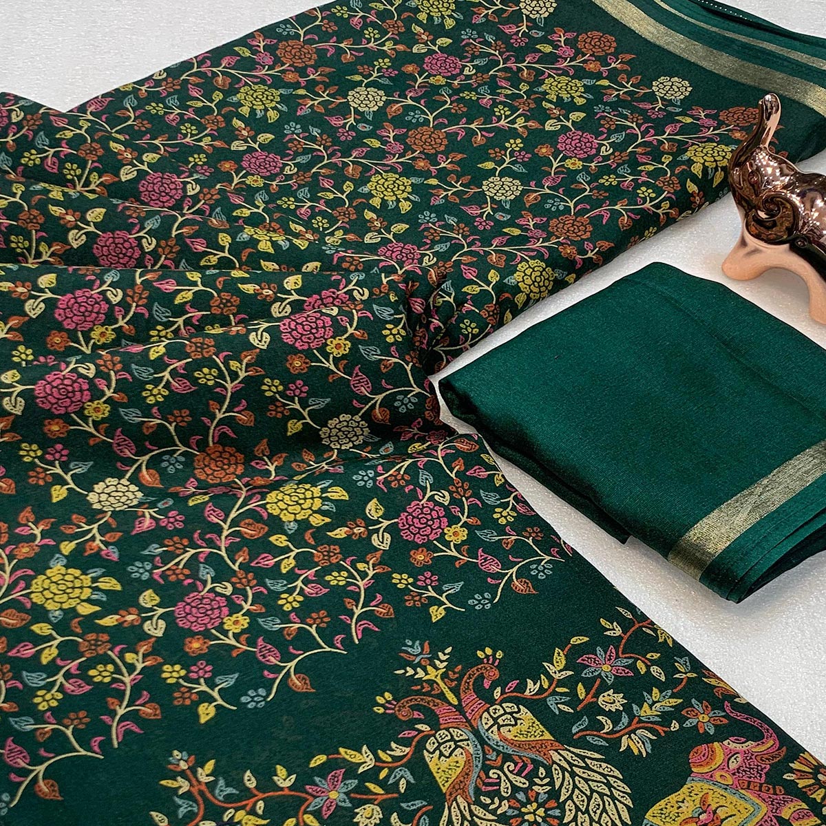 Green Floral Printed Tussar Silk Blend Saree Accentuated With Rich Zari Border Work