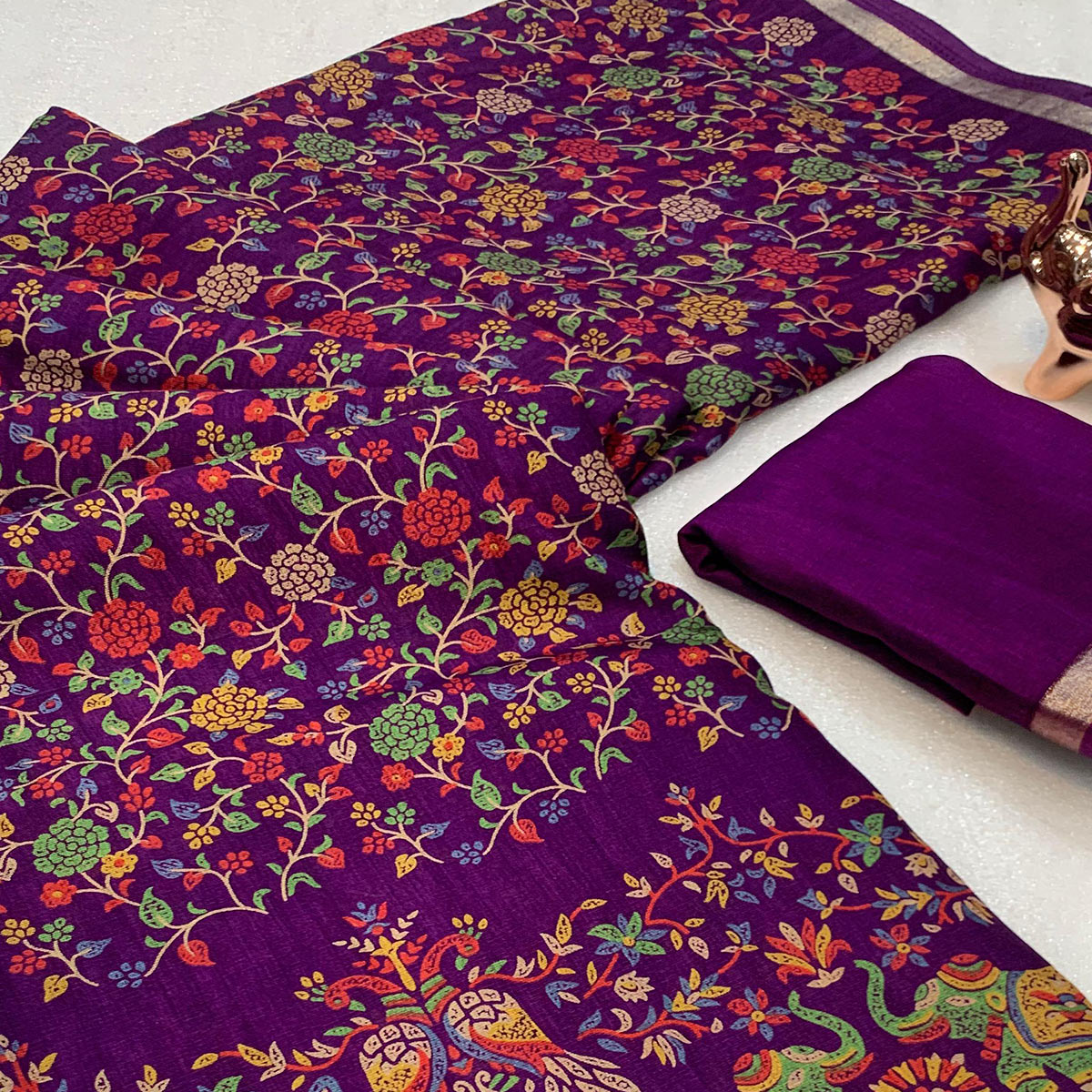 Purple Floral Printed Tussar Silk Blend Saree Accentuated With Rich Zari Border Work