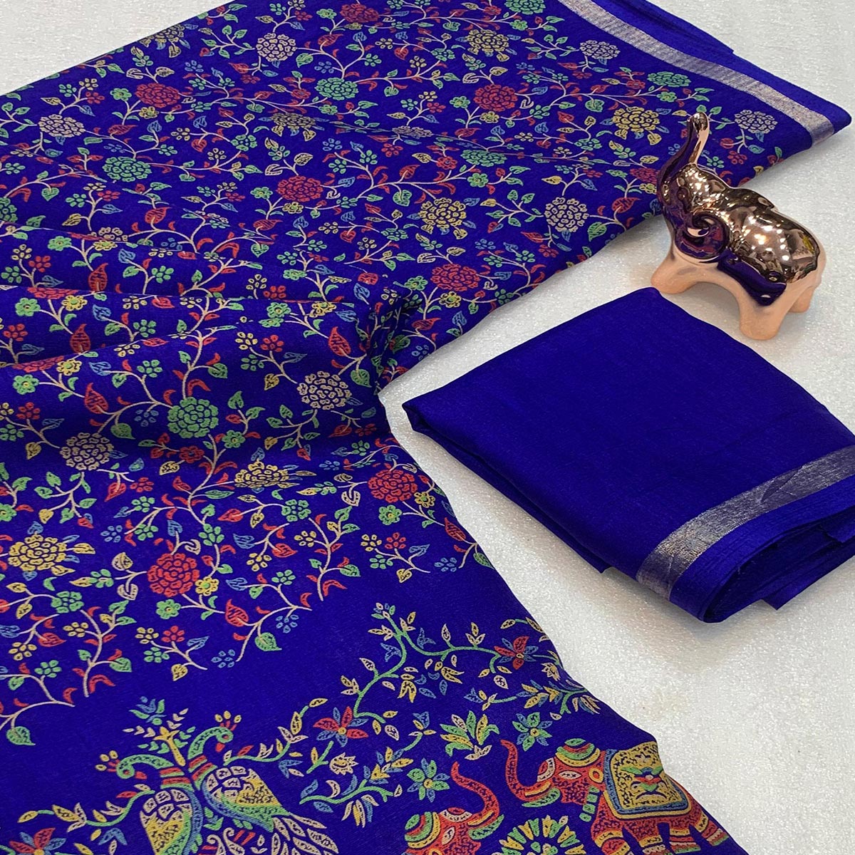 Royal Blue Floral Printed Tussar Silk Blend Saree Accentuated With Rich Zari Border Work