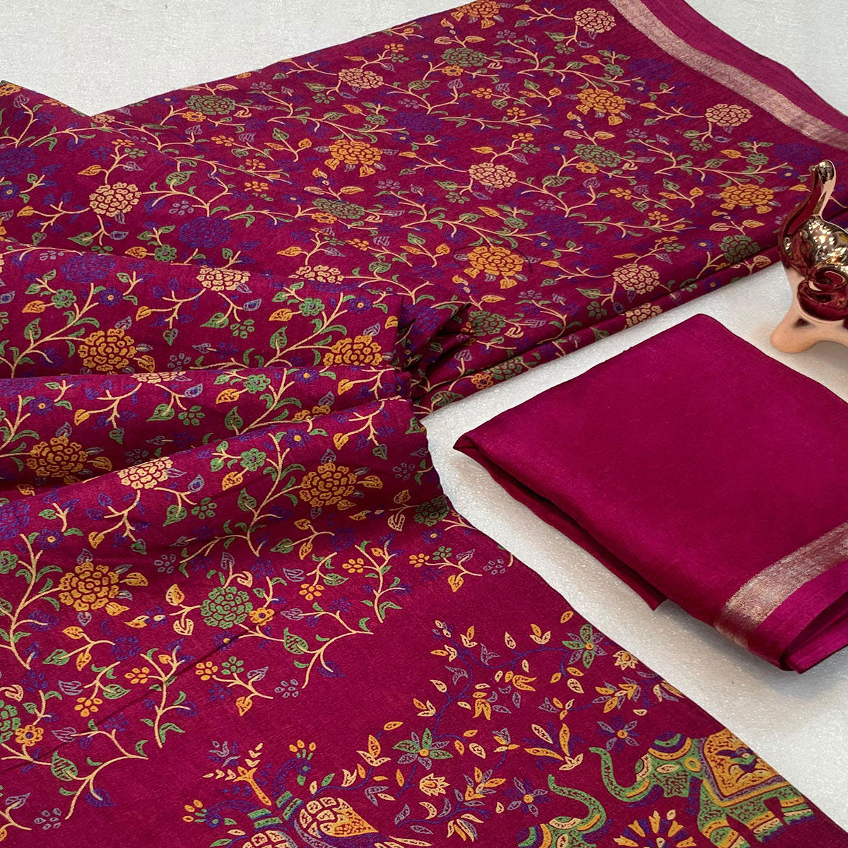Wine Floral Printed Tussar Silk Blend Saree Accentuated With Rich Zari Border Work