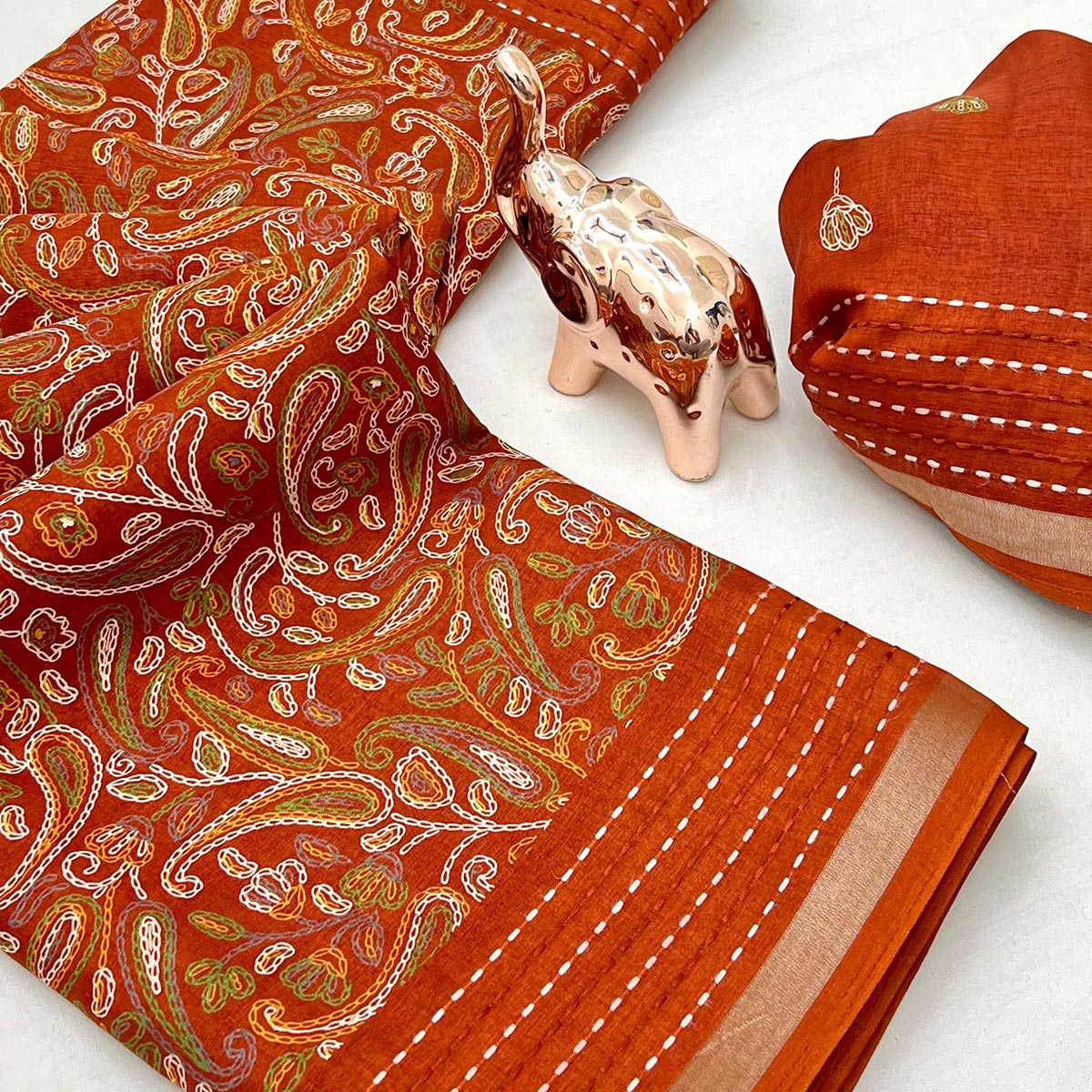 Rusty Orange Floral Print Saree In Crepe Cotton Adorned With Kantha Embroidery