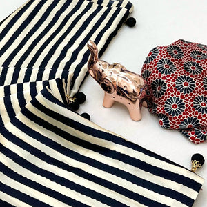 Luxe Partywear Saree in Black Satin with Modern Striped Print and Flowing Drape