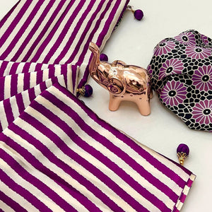 Luxe Partywear Saree in Purple Satin with Modern Striped Print and Flowing Drape