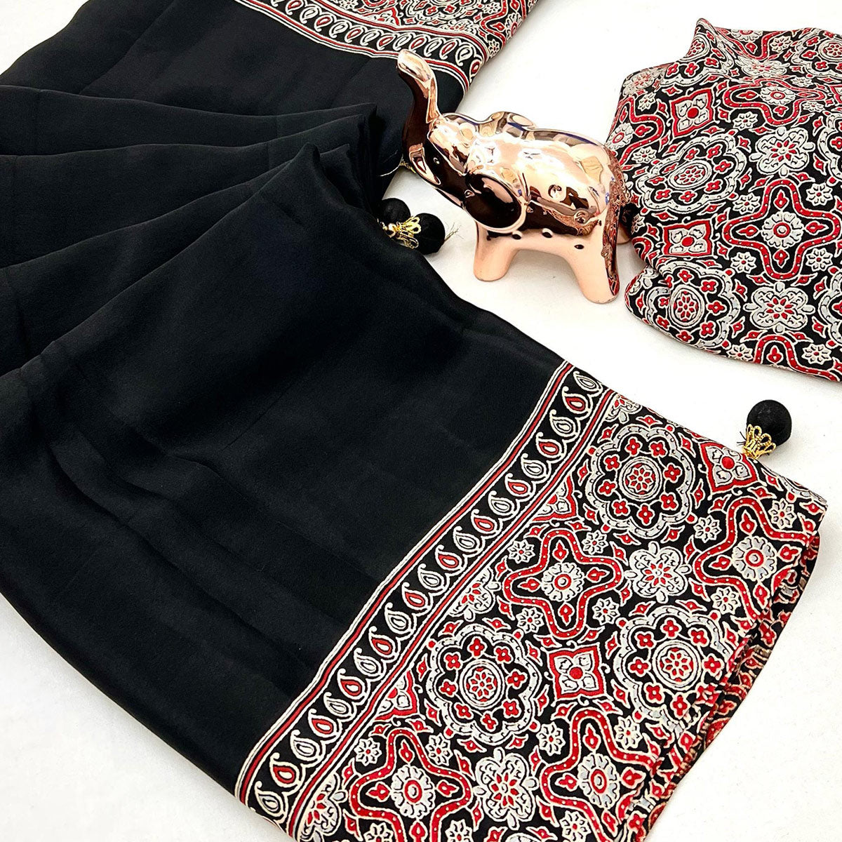 Black Satin Saree Showcasing Rich Ajrakh Printed Design & Tassel Finished Pallu