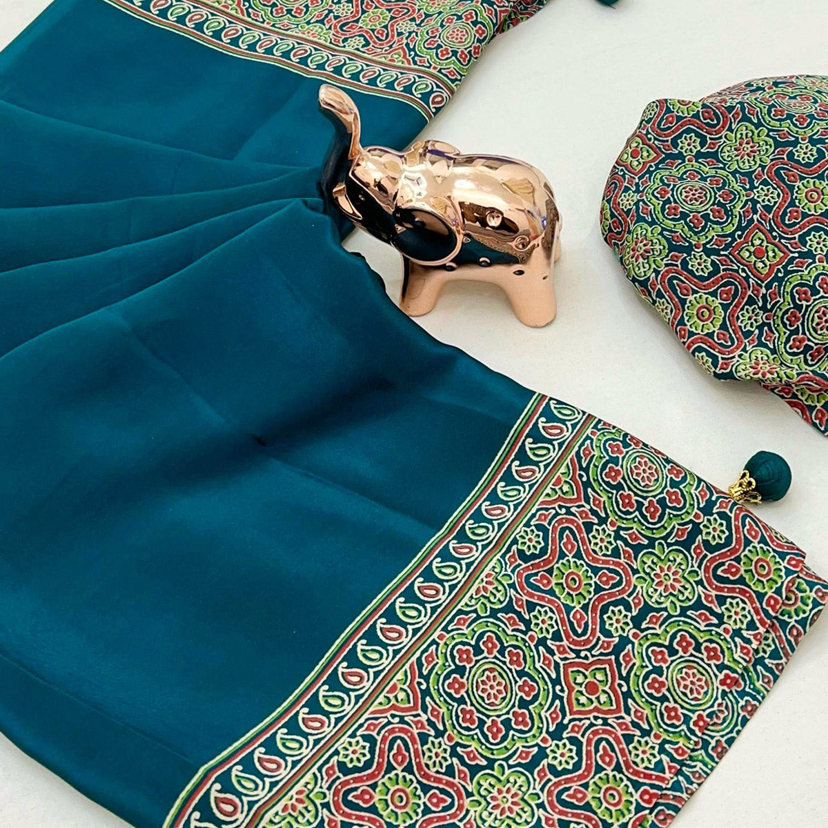 Teal Satin Saree Showcasing Rich Ajrakh Printed Design & Tassel Finished Pallu