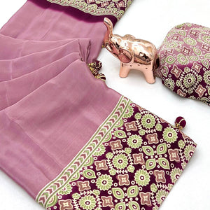 Dusty Rose Pink Solid Satin Saree Featuring Bold Ajrakh Print and Tassel Accented Pallu