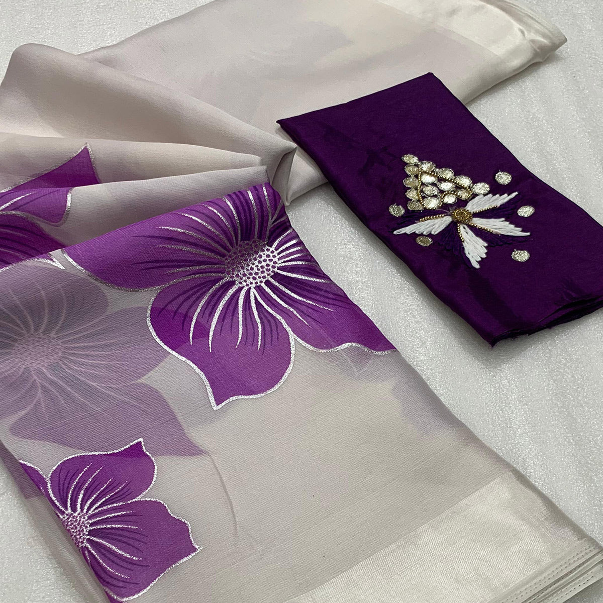 White and Purple Organza Saree with Intricate Floral Foil Print
