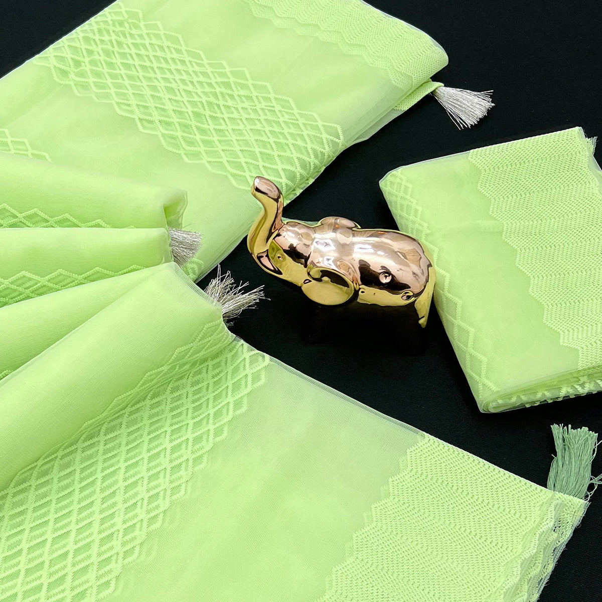 Green Woven Thread Work Net Saree With Tassels