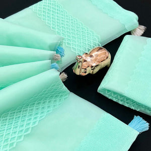 Turquoise Woven Thread Work Net Saree With Tassels