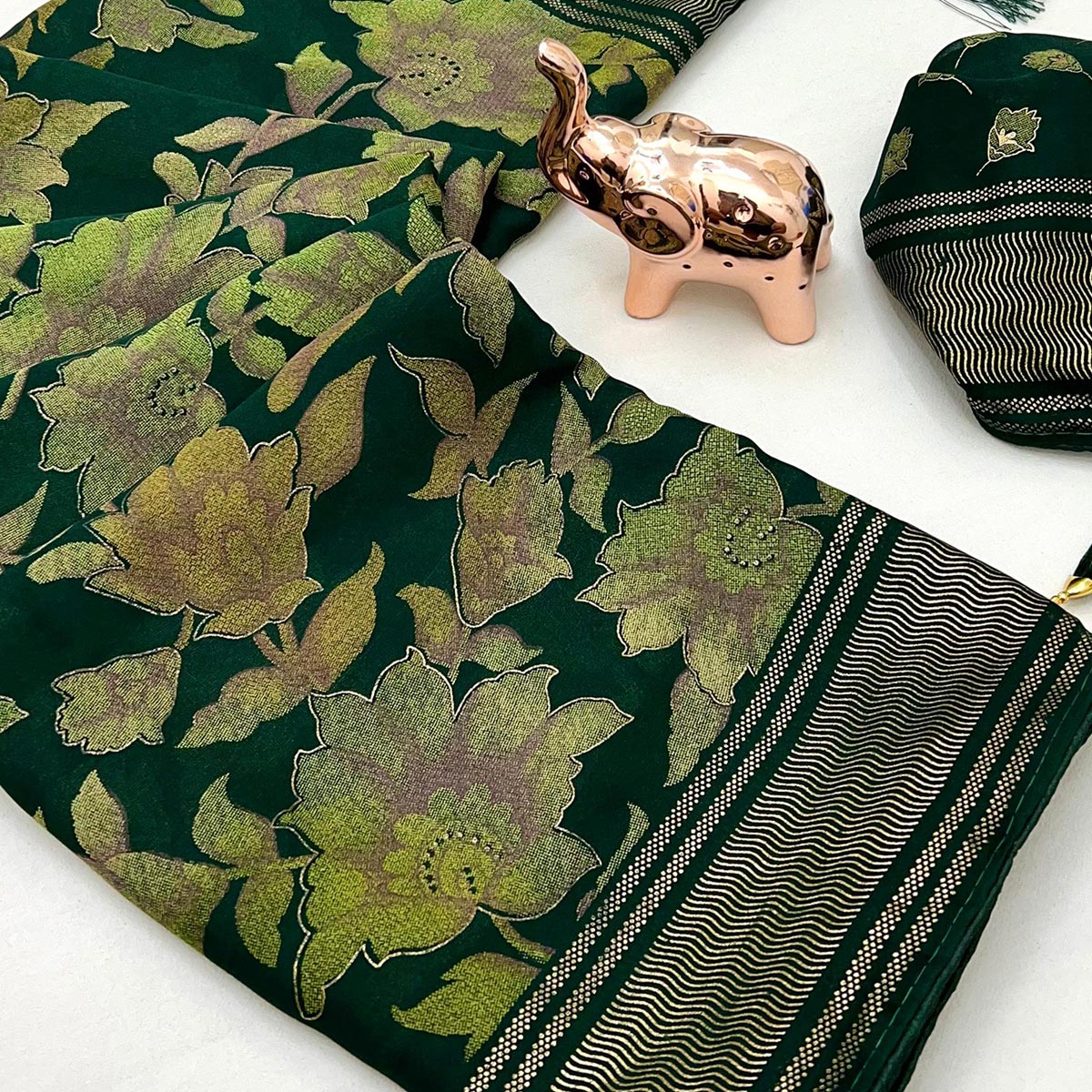 Green Floral Foil Printed Georgette Saree With Tassels