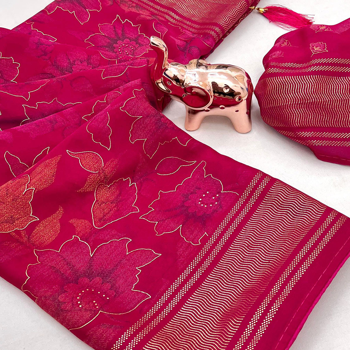 Pink Floral Foil Printed Georgette Saree With Tassels