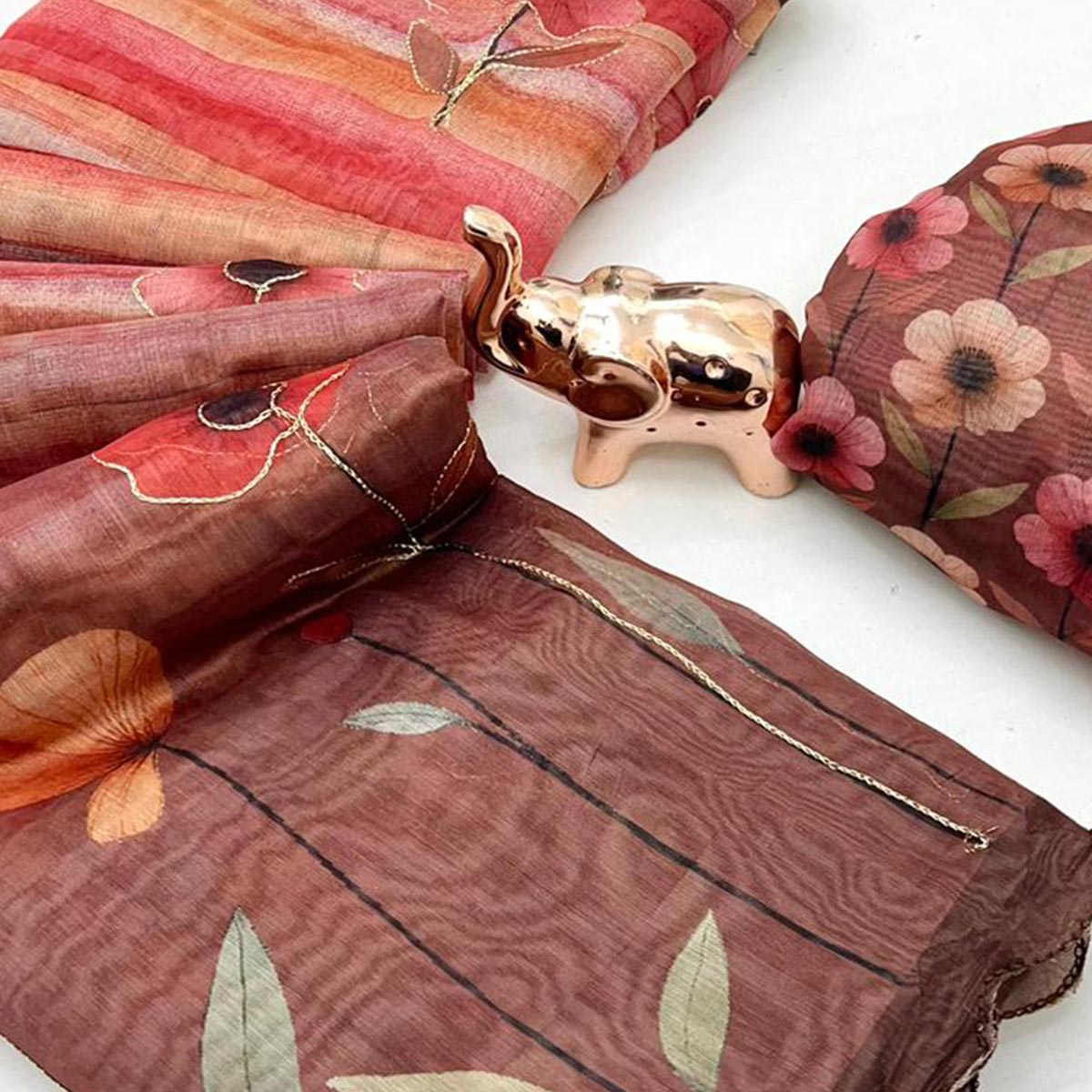 Brown Chanderi Cotton Saree Featuring Floral Print Design and Artistic Embroidered Work