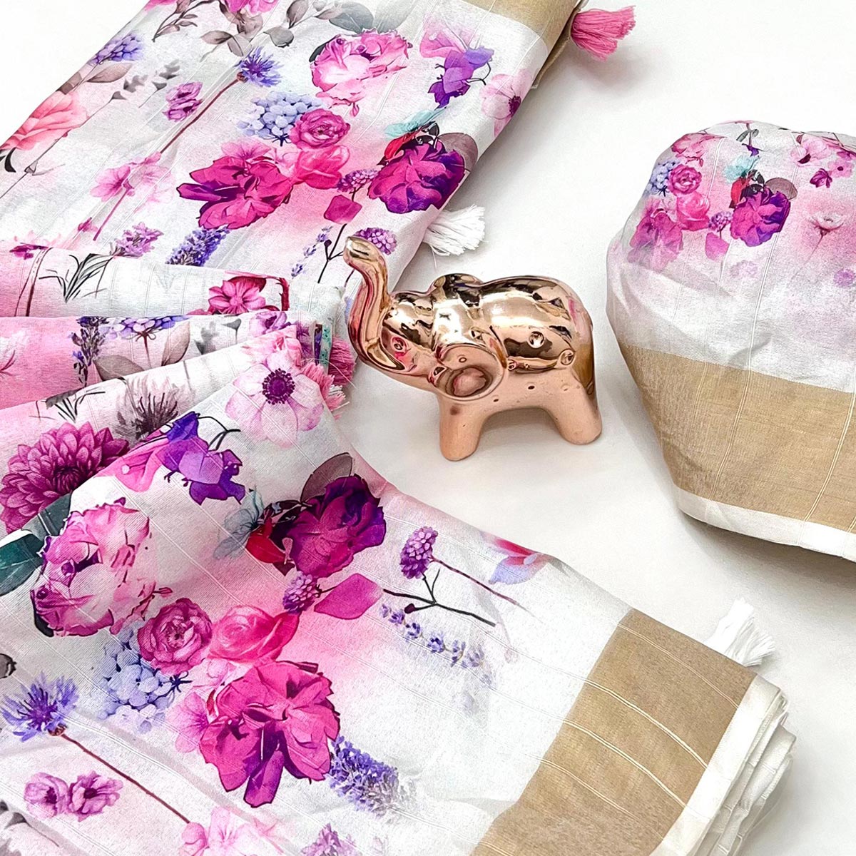 Festive White Silk Blend Saree with Subtle Floral Print and Shimmering Zari Border