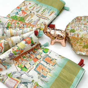 Designer Off White Saree with All-Over Floral Prints and Elegant Zari Border