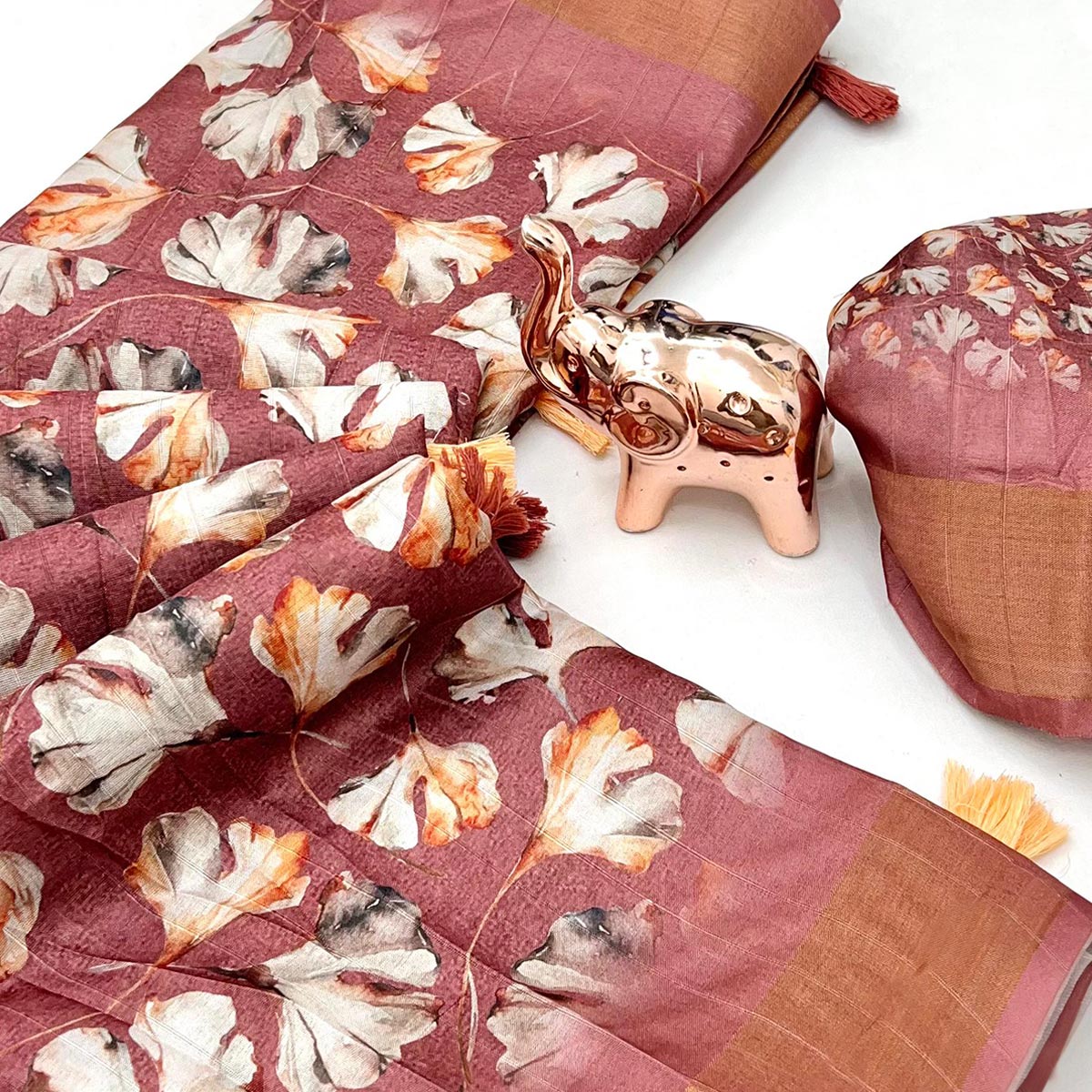 Festive Mauve Silk Blend Saree with Subtle Floral Print and Shimmering Zari Border