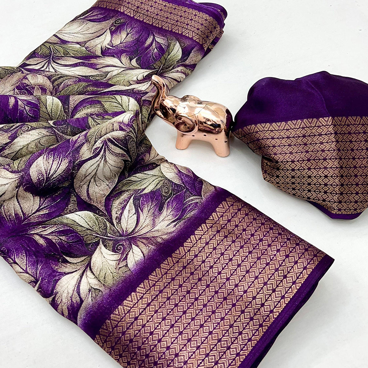 Purple Leaf Printed Dola Silk Marshmallow Saree With Paisley Jaal Pallu & Lustrous Weaving Border
