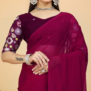 Pink Solid Georgette Saree With Tassels