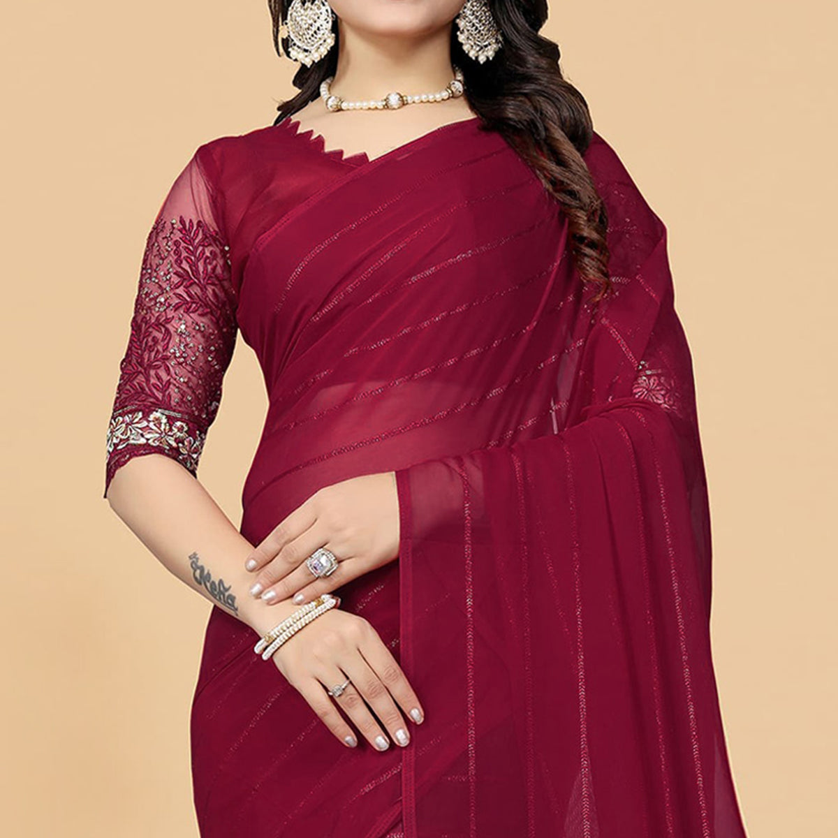 Maroon Woven Georgette Saree with Tassels