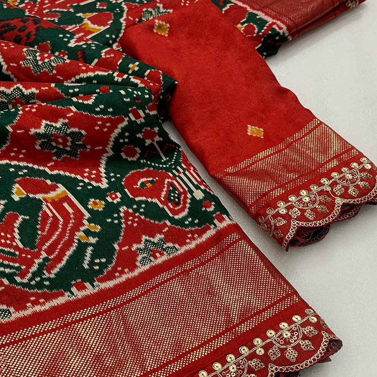 Green & Red Ikkat Printed Dola Silk Saree With Sequins Embroidery Border