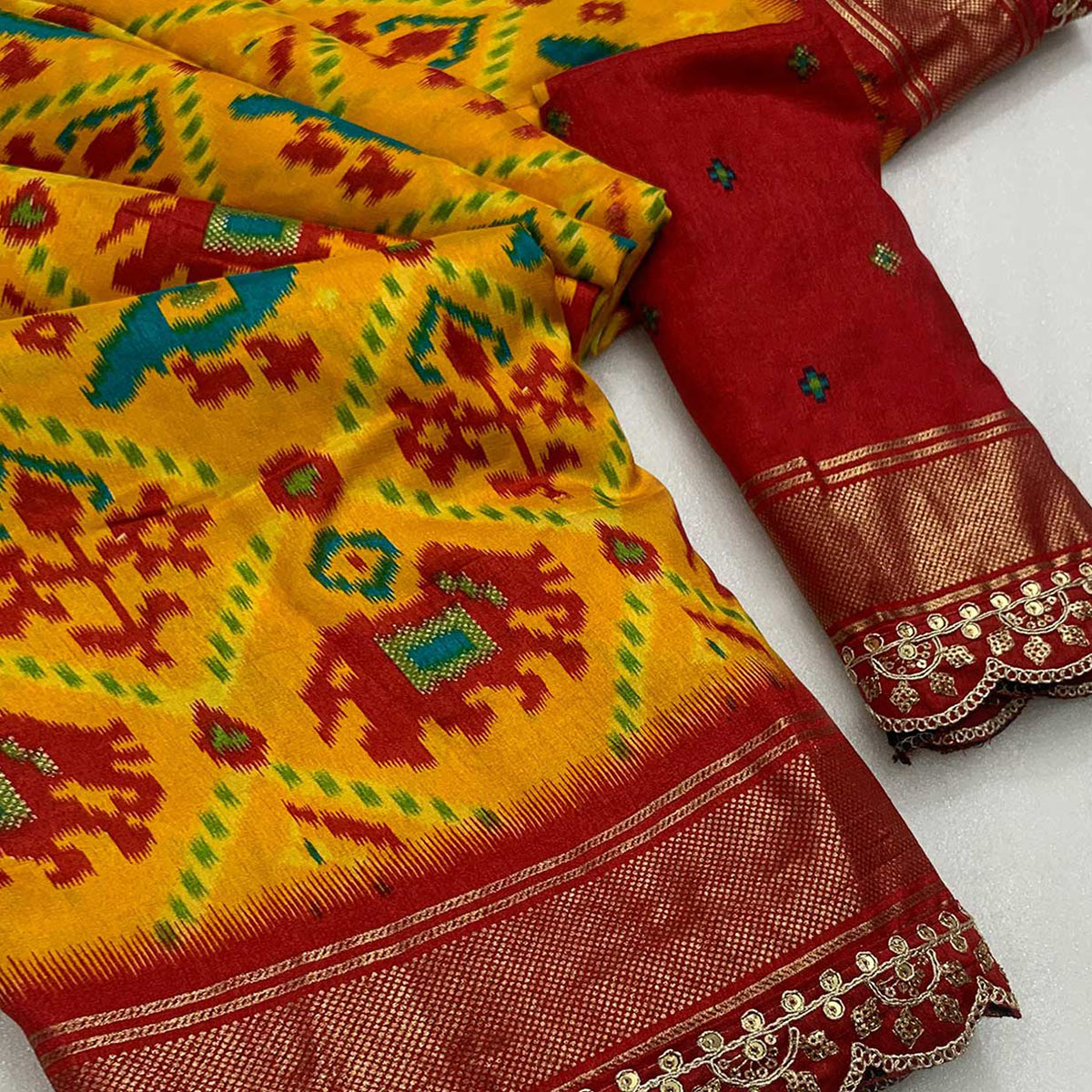 Mustard & Red Ikkat Printed Dola Silk Saree With Sequins Embroidery Border