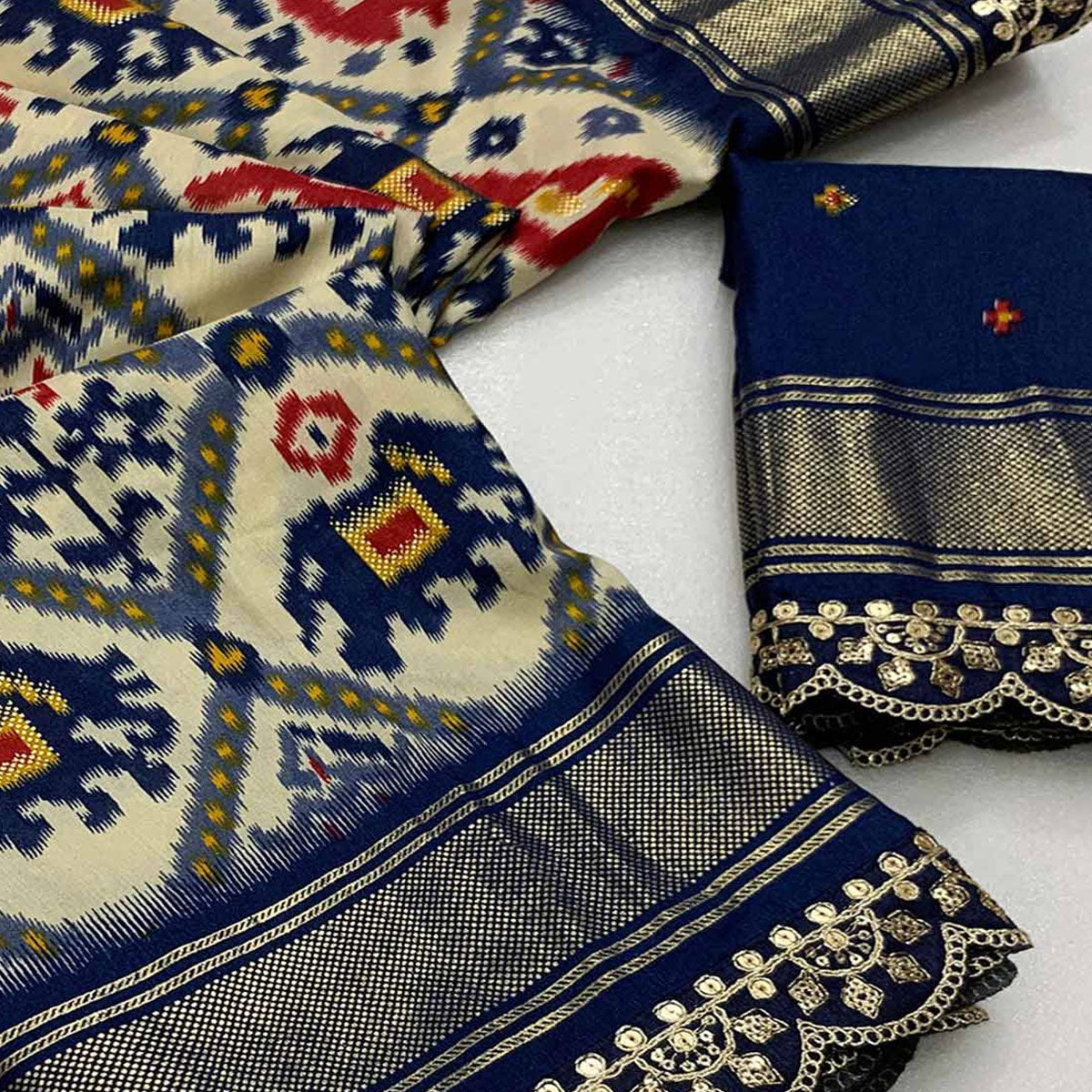 Off White & Blue Ikkat Printed Dola Silk Saree With Sequins Embroidery Border