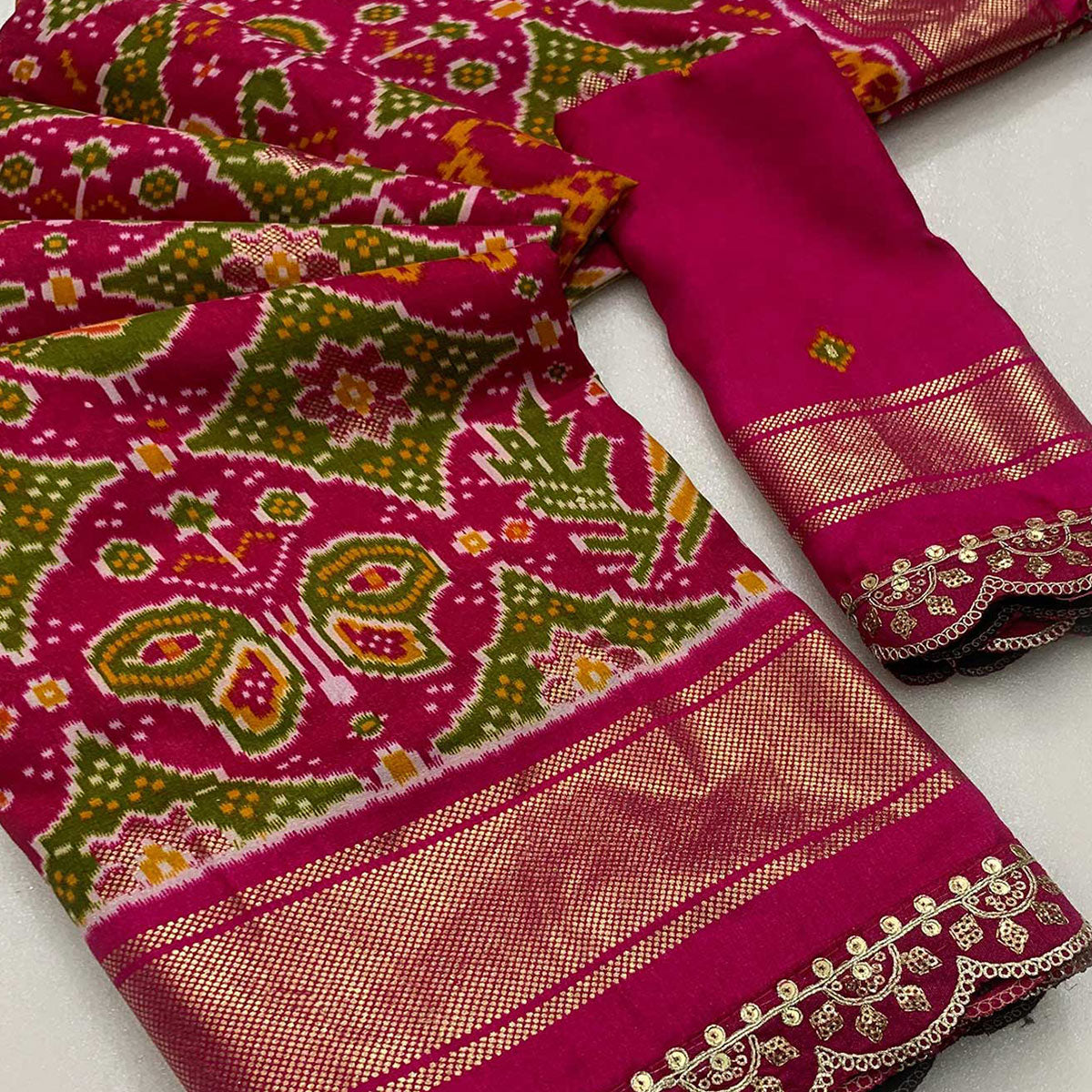 Pink & Green Ikkat Printed Dola Silk Saree With Sequins Embroidery Border