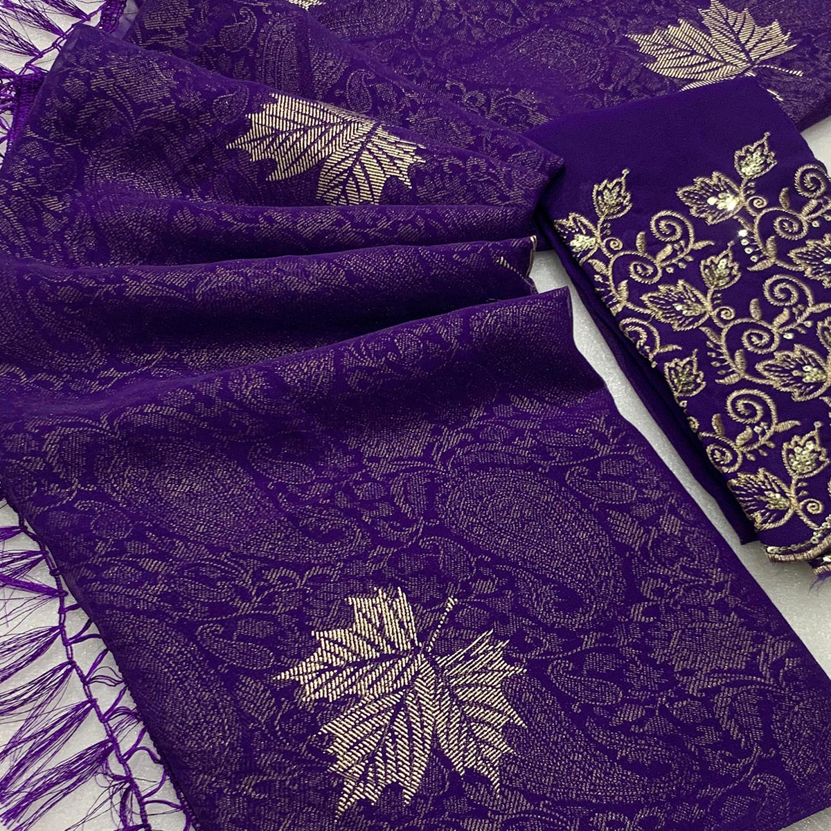 Violet Foil Printed Georgette Saree With With Tassels