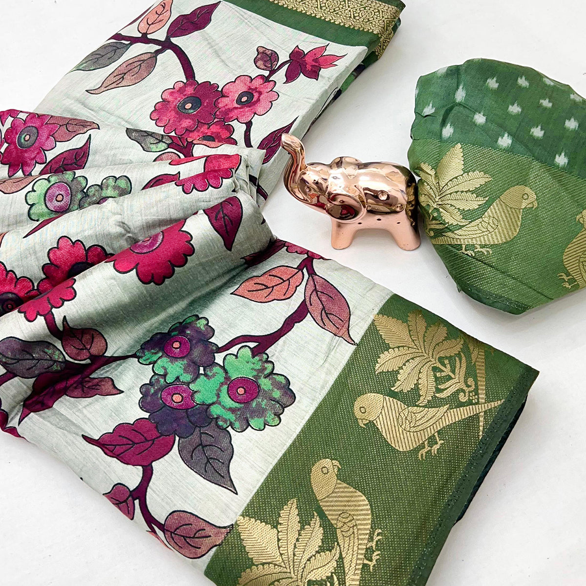 Mint Green Floral Printed Saree Crafted in Soft Mulmul Cotton with Zari Border