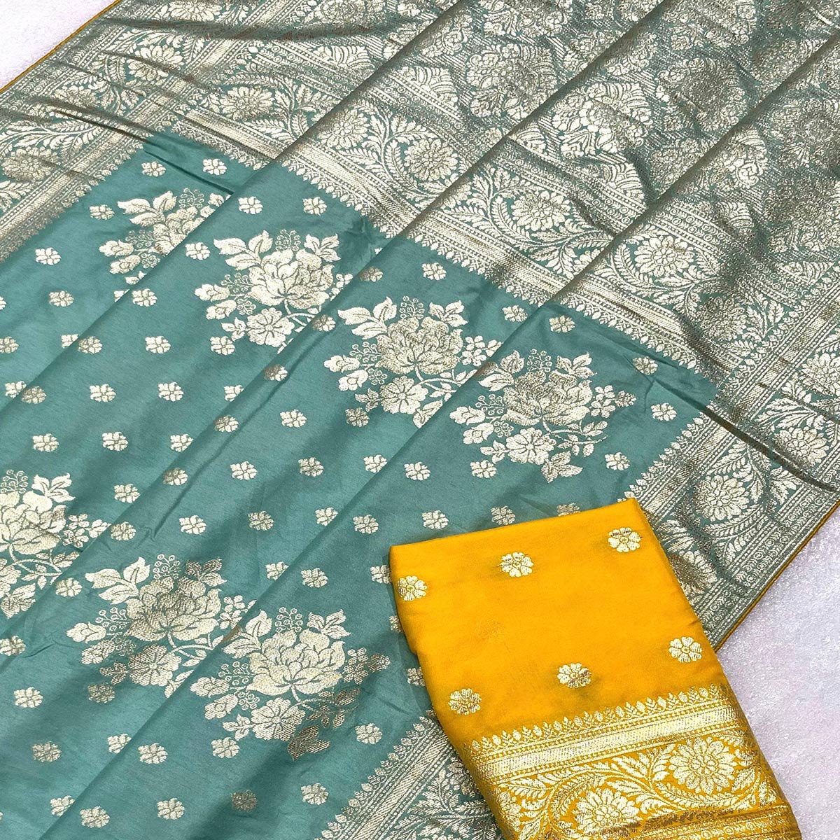 Turquoise Floral Woven Dola Silk Saree