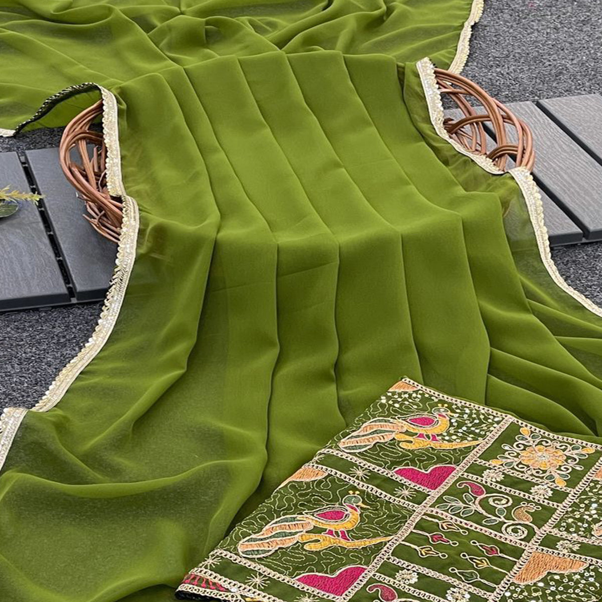 Green Solid Georgette Saree With Sequins Embroidered Border