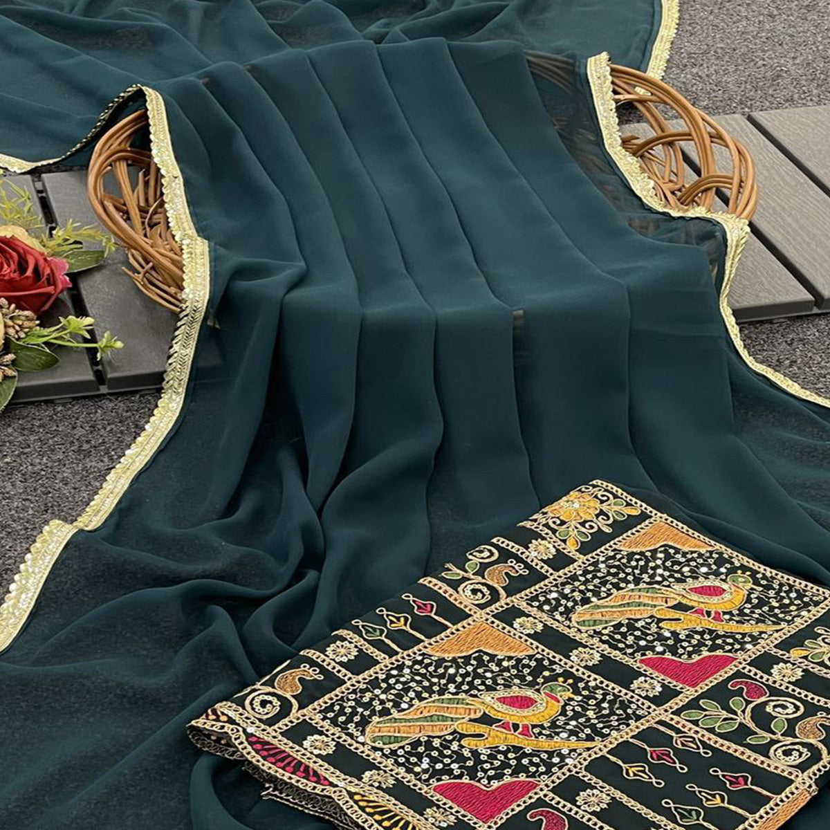 Pine Green Solid Georgette Saree With Sequins Embroidered Border