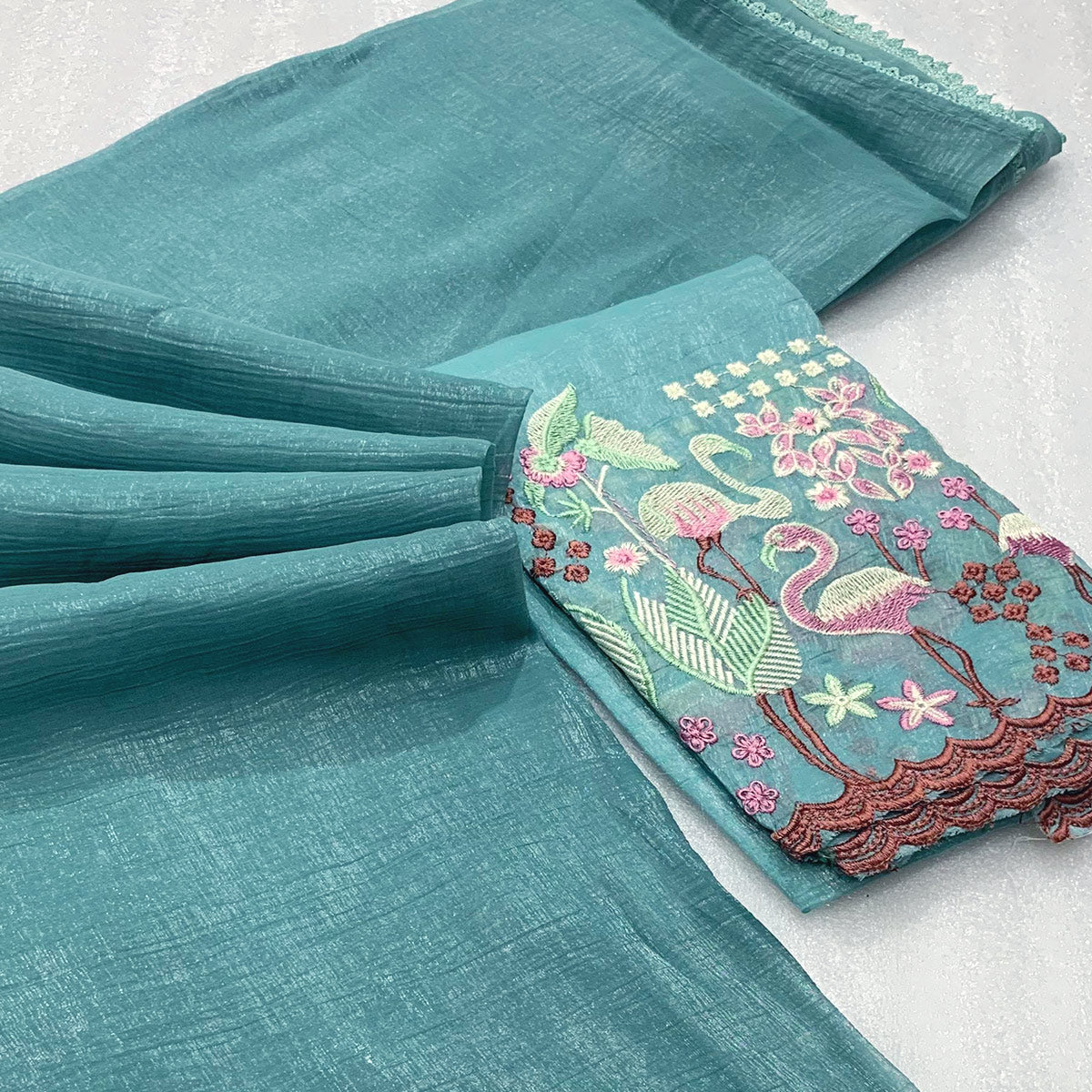 Teal Solid Crunchy Crepe Saree With Embroidery Border