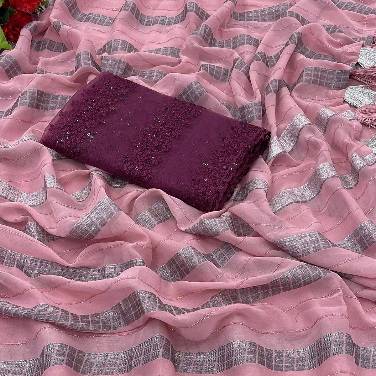 Pink Zari Striped Georgette Saree With Tassels