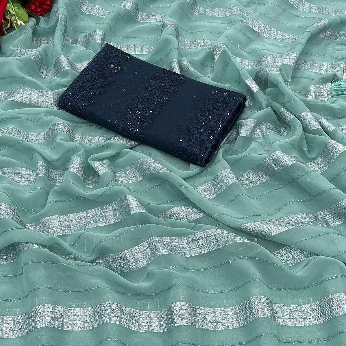 Sea Green Zari Striped Georgette Saree With Tassels