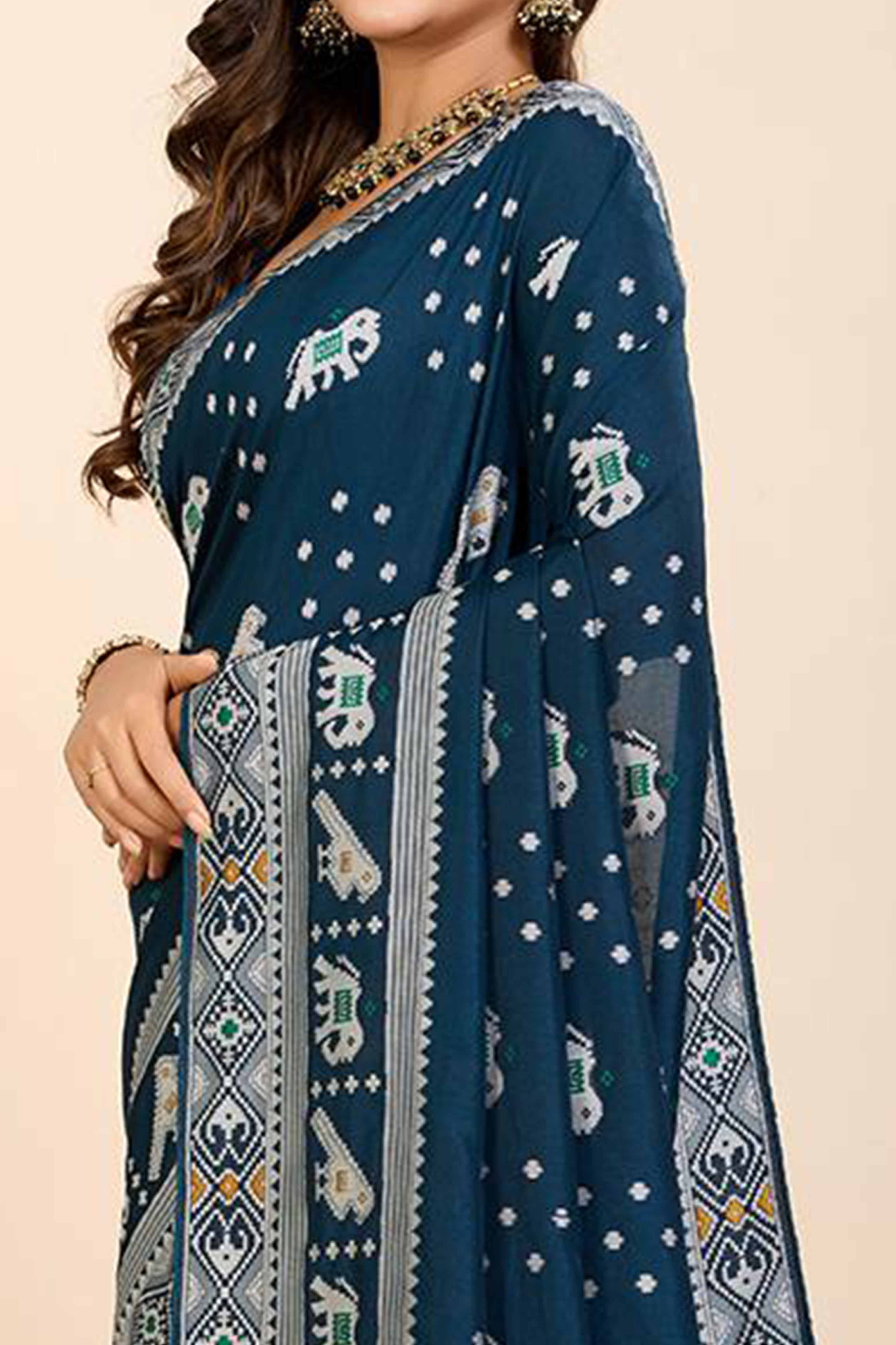 Blue Woven Dola Silk Patola Saree With Tassels