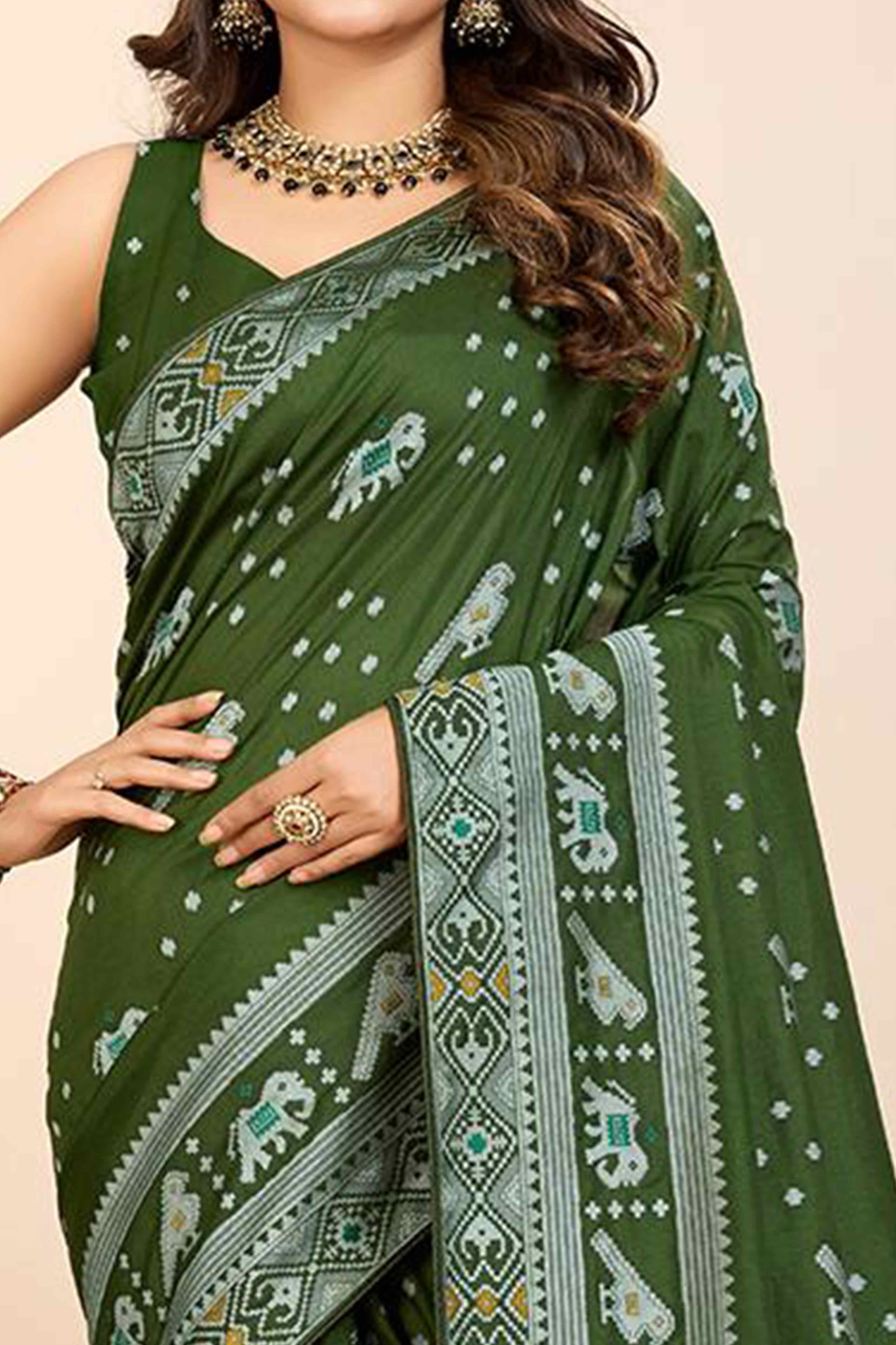 Green Woven Dola Silk Patola Saree With Tassels